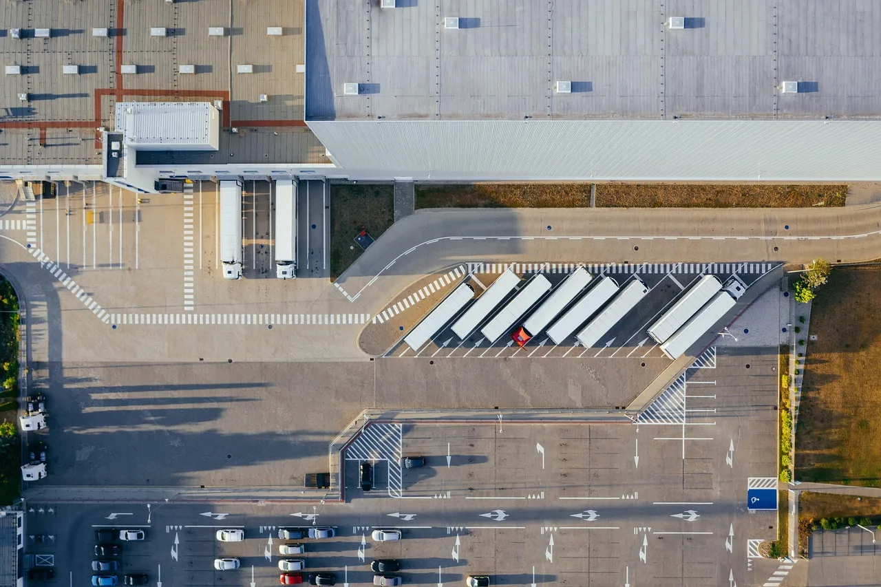 Aerial view of trucks at a distribution center dock